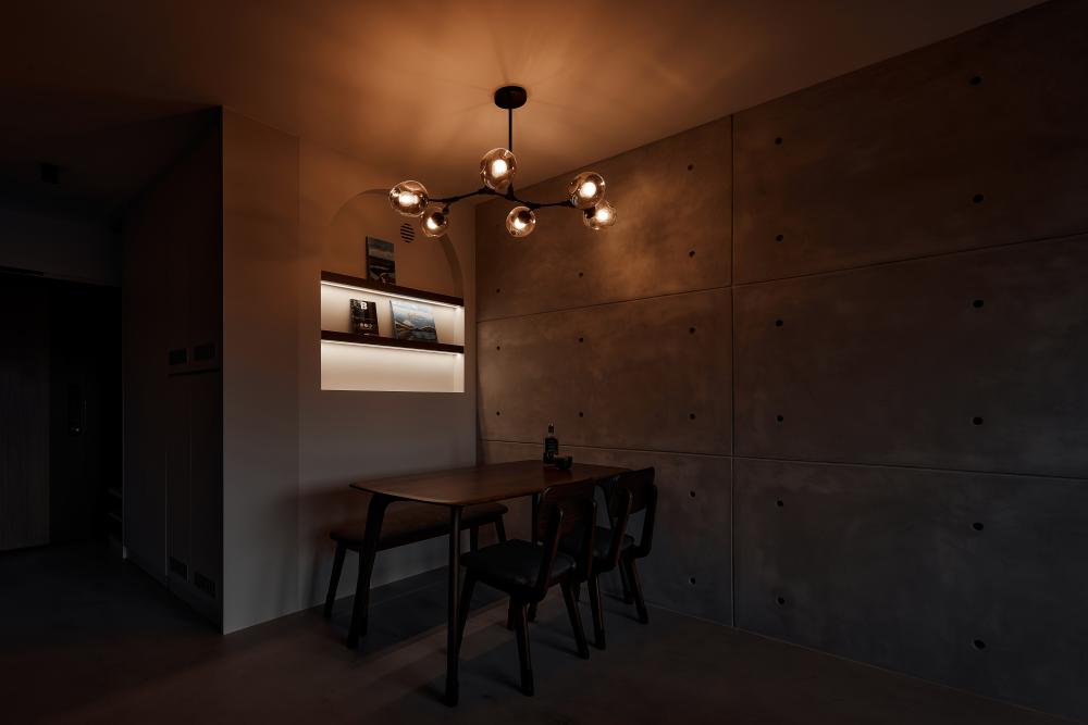 Industrial Living Room with Bookshelf and Ceiling Light