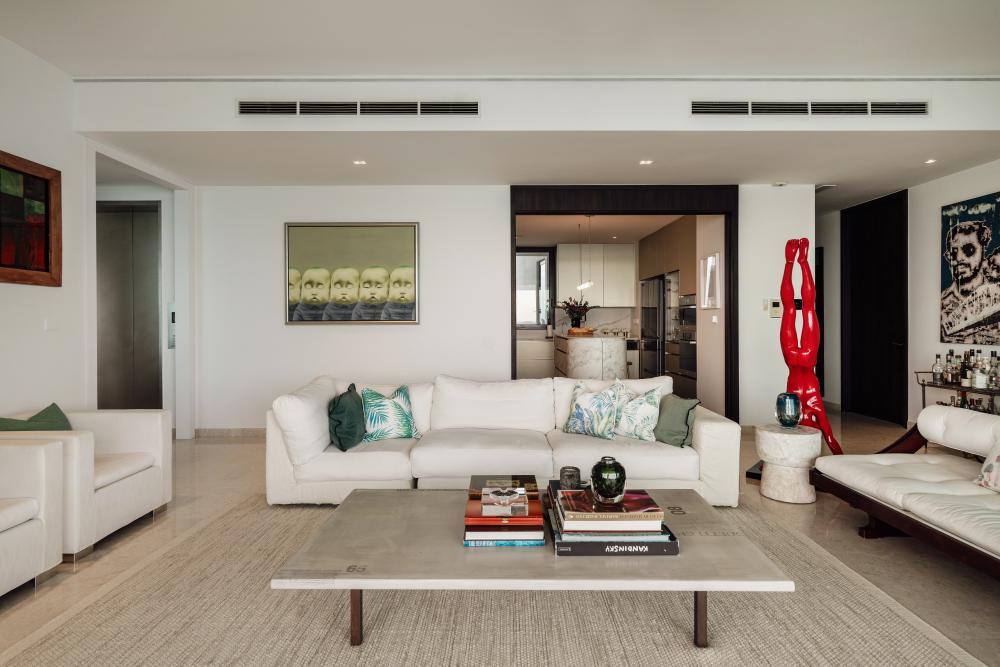 Contemporary Living Room with Granite Floor and Cove Lighting