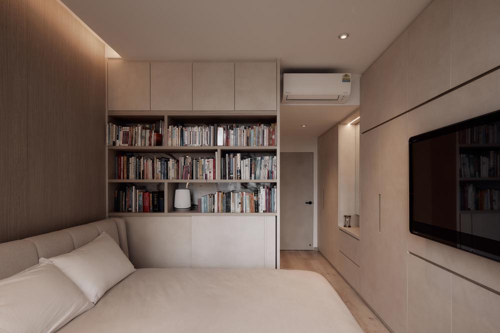 Modern Bedroom with Bookshelf and Wardrobe