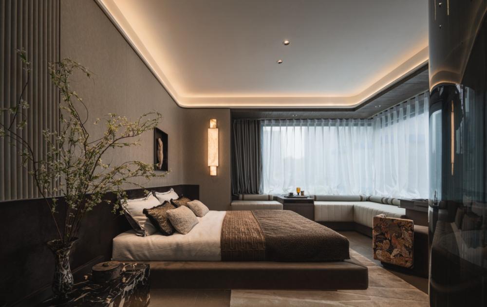 Contemporary Bedroom with Settee and Homogeneous Tiles