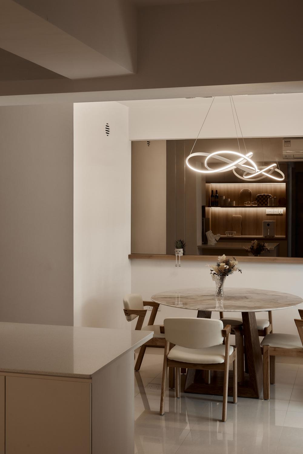 Scandinavian Dining Room with Drop Light and Dining Table