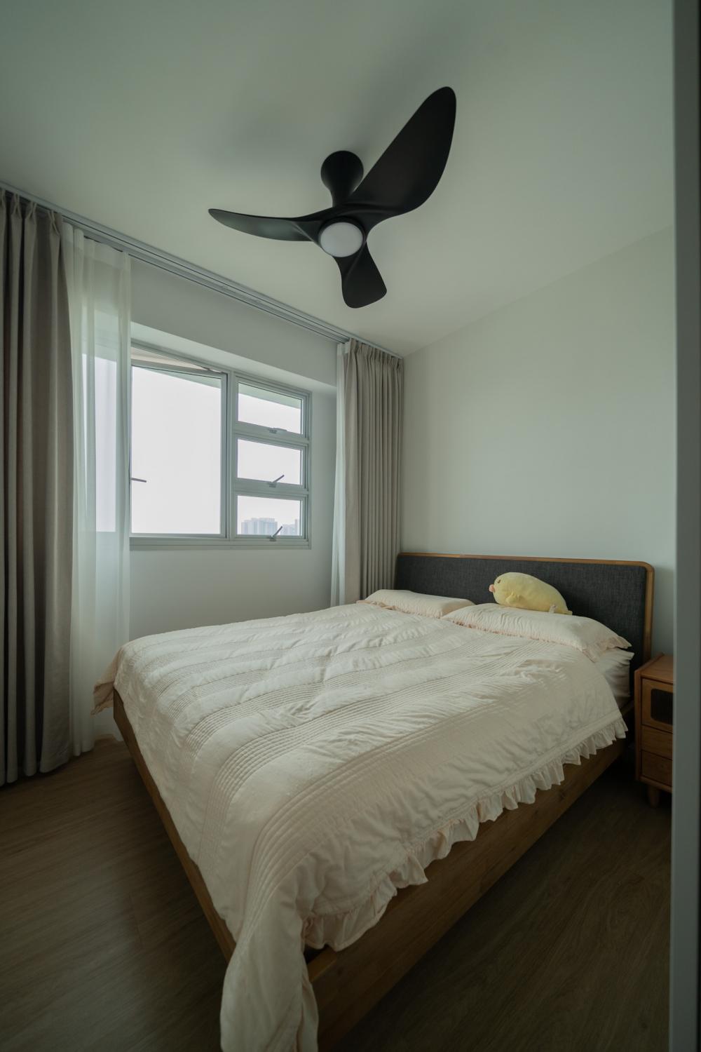 Minimalist Bedroom with Wood Flooring and Queen Bed