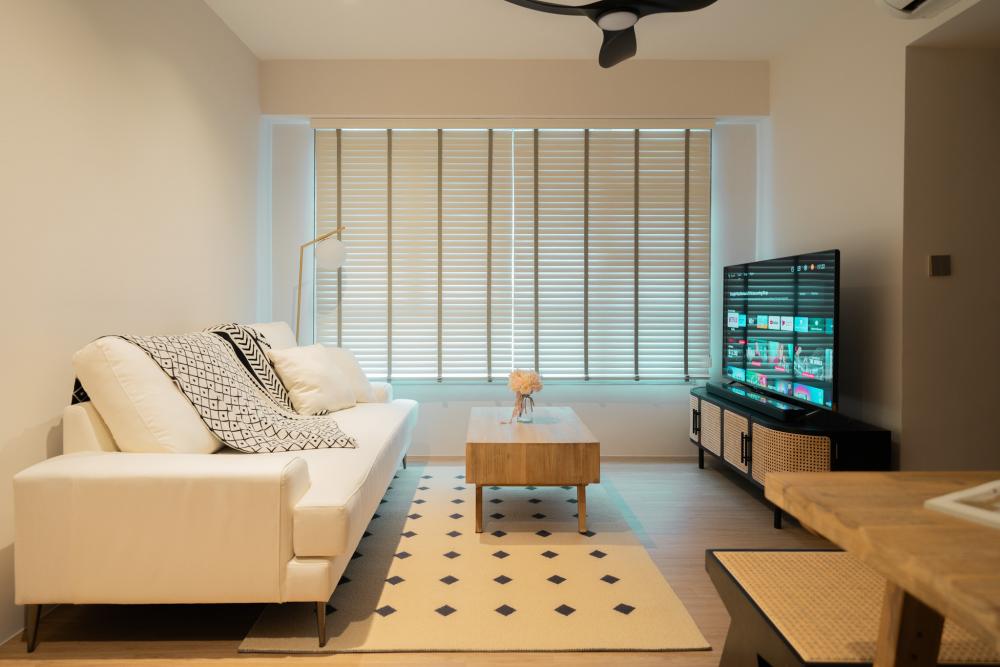 Minimalist Living Room with Bookshelf and Wood Flooring