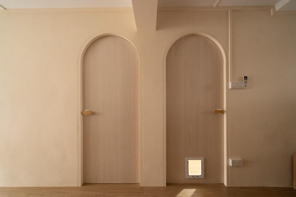 Contemporary Hallway with Artwork and Doors