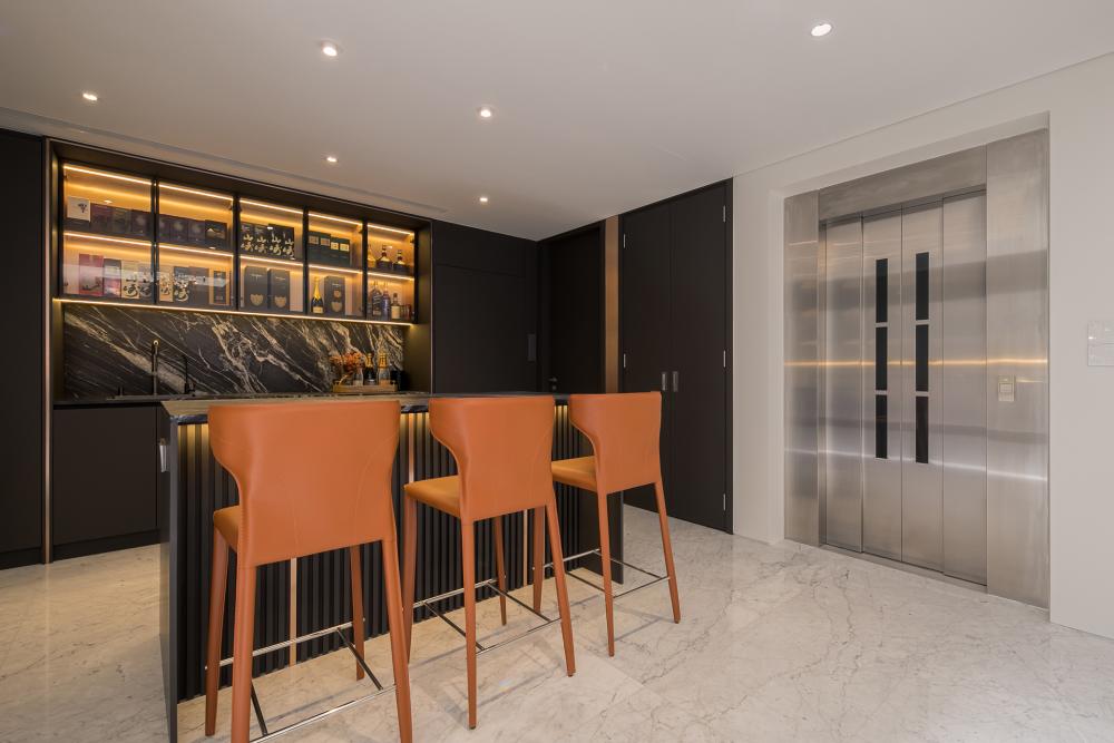 Contemporary Wine Cellar with TV Console and Shelving Units