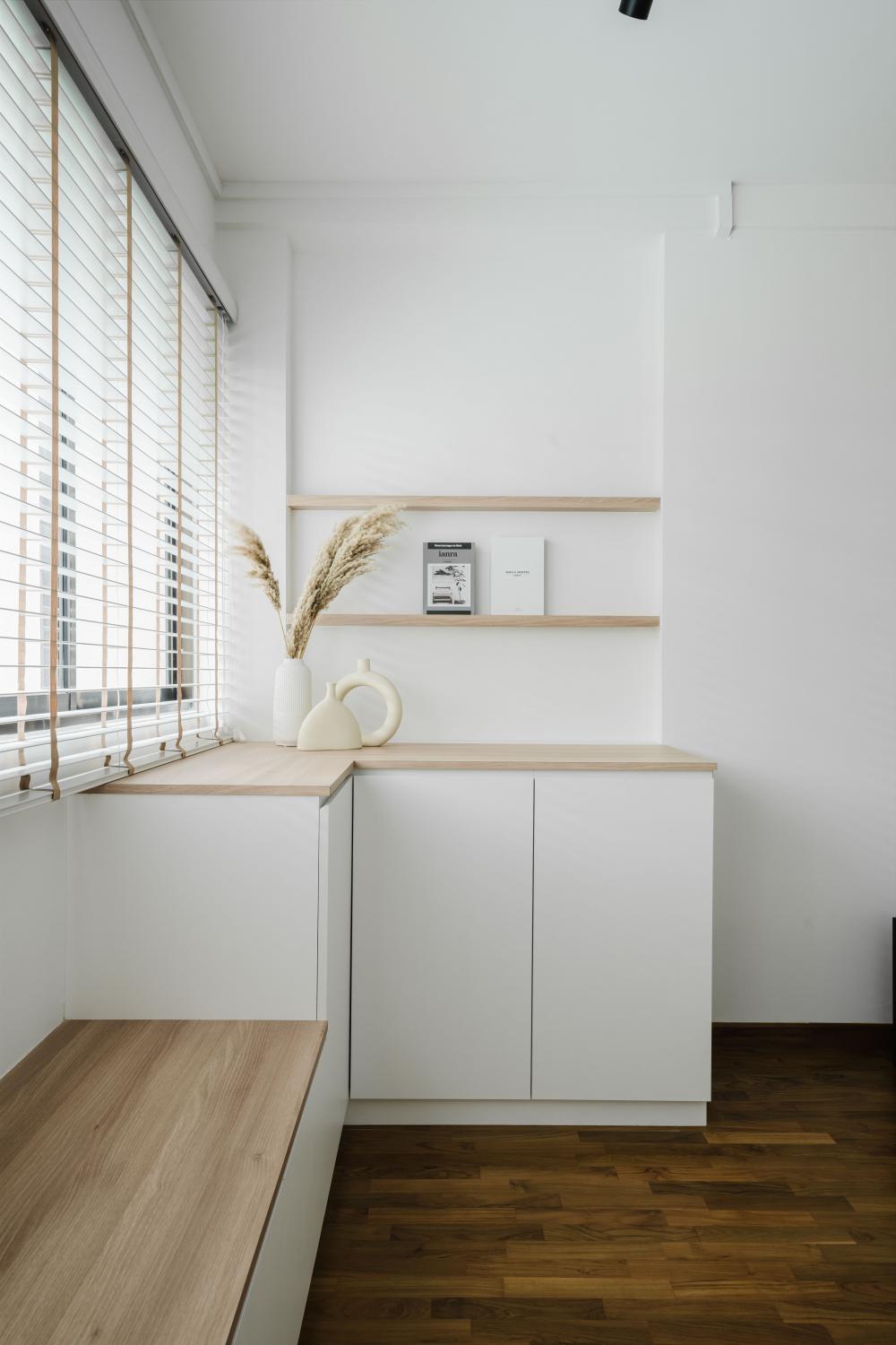 Scandinavian Entryway with Bookshelf and Seating Bench