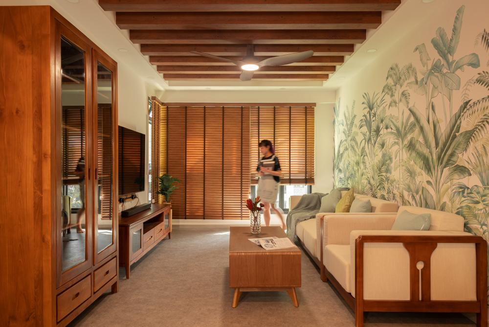 Asian Living Room with Bookshelf and TV Console