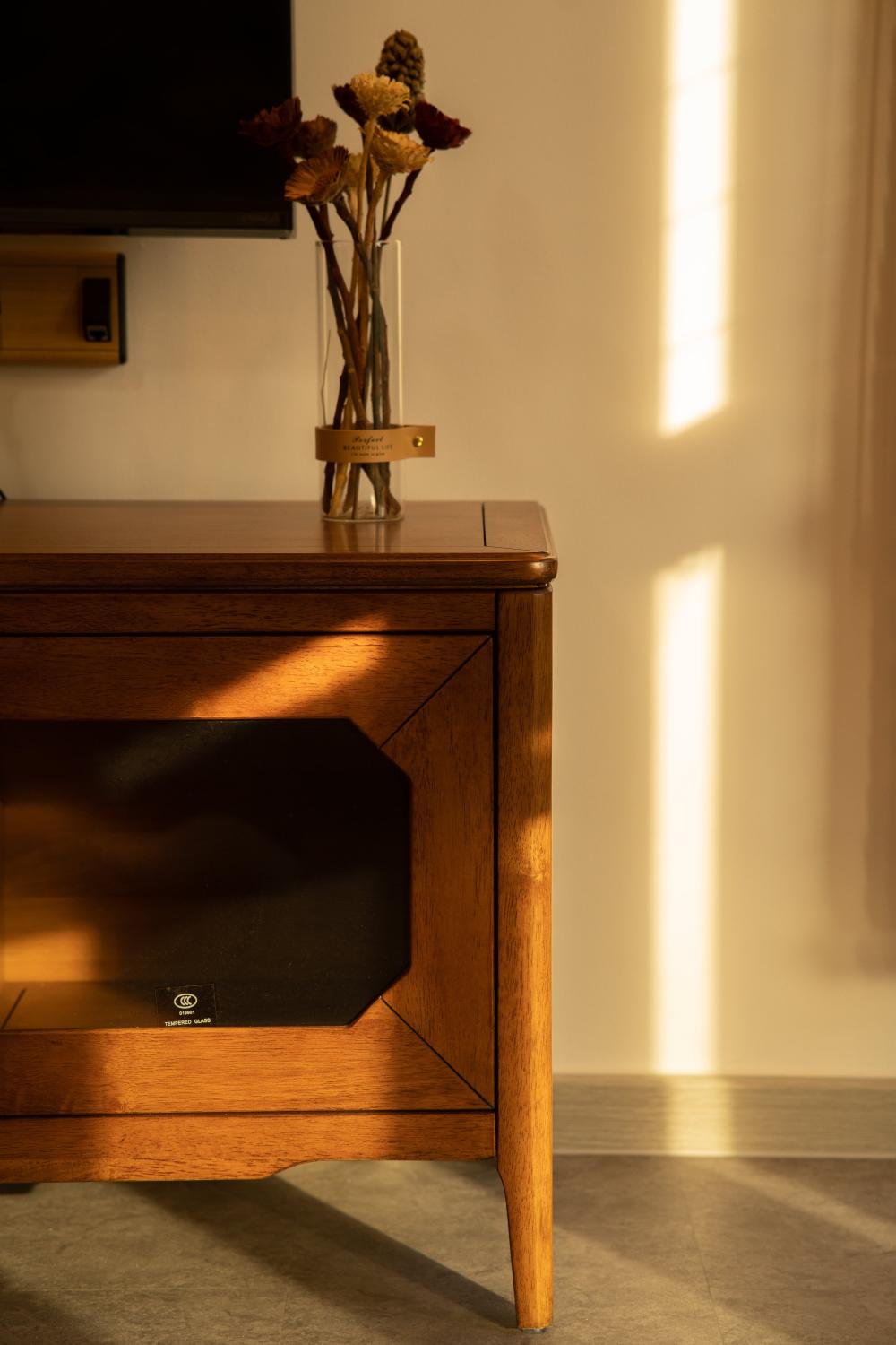 Asian Living Room with TV Console and TV