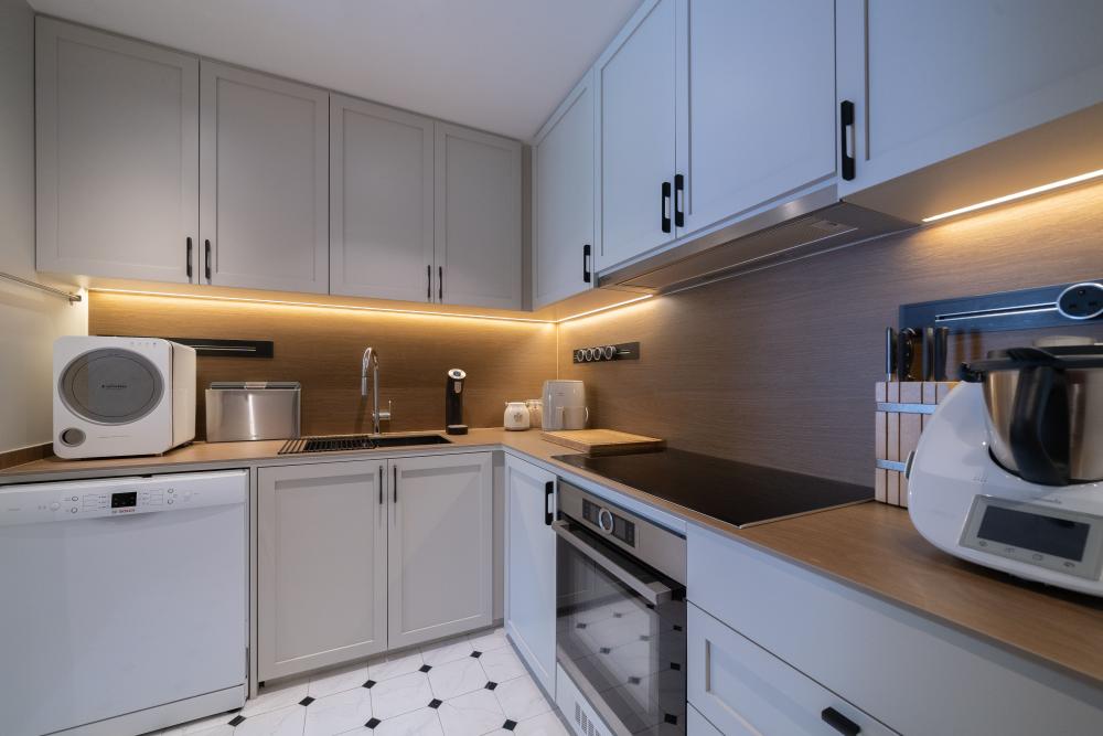 Minimalist Kitchen with Countertop and Mosaic