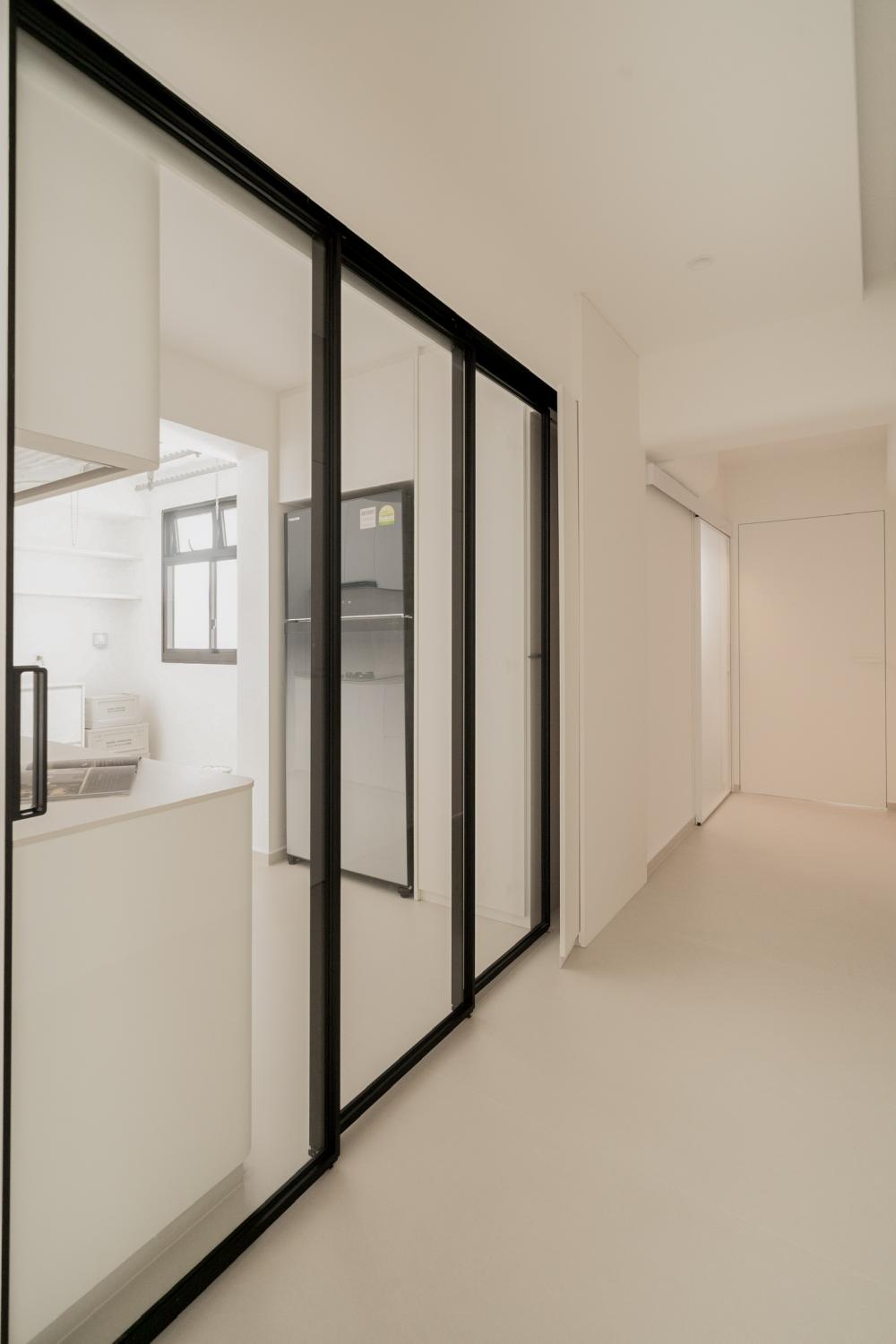 Minimalist Hallway with Glass Door and Doors