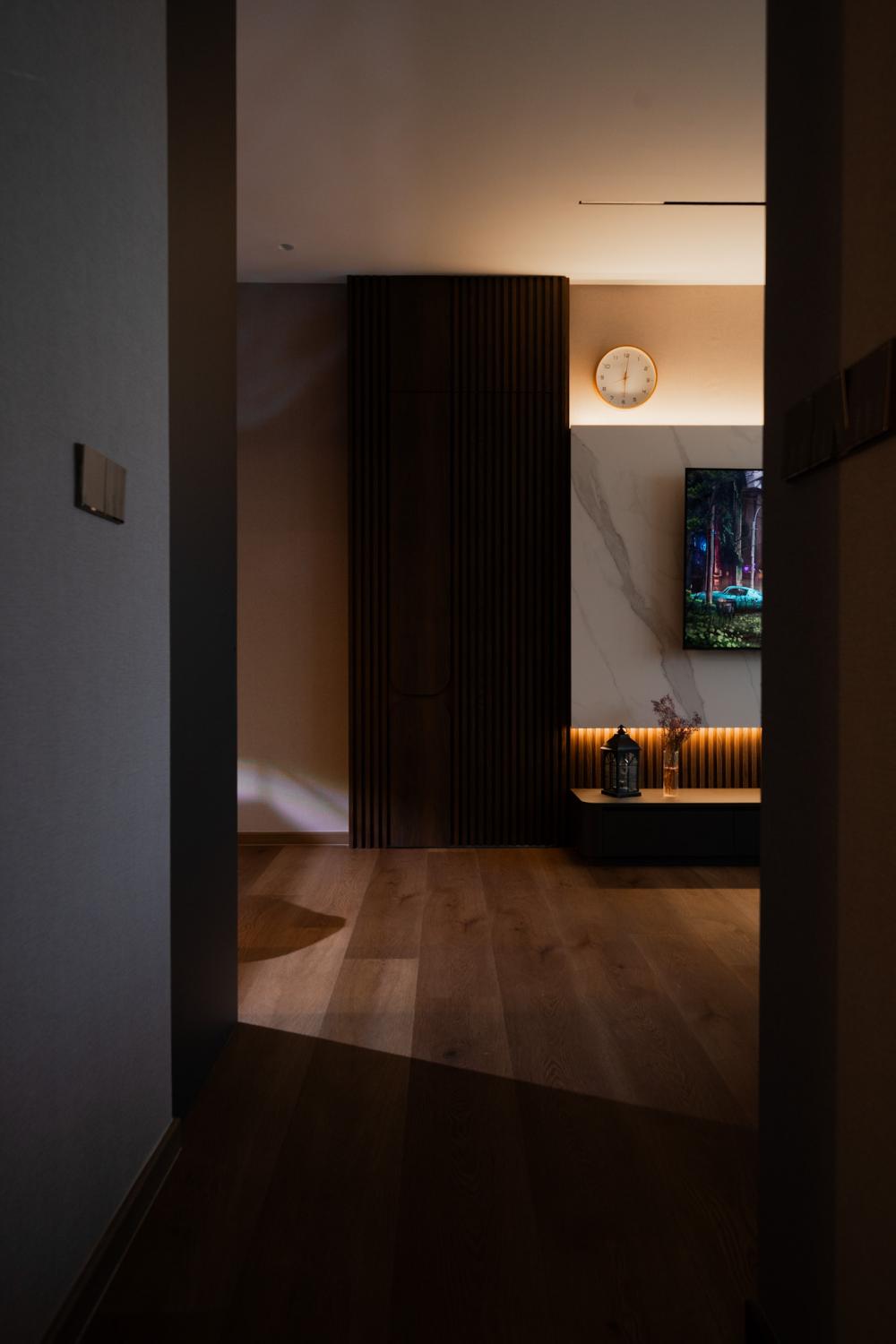 Modern Hallway with Bookshelf and Artwork