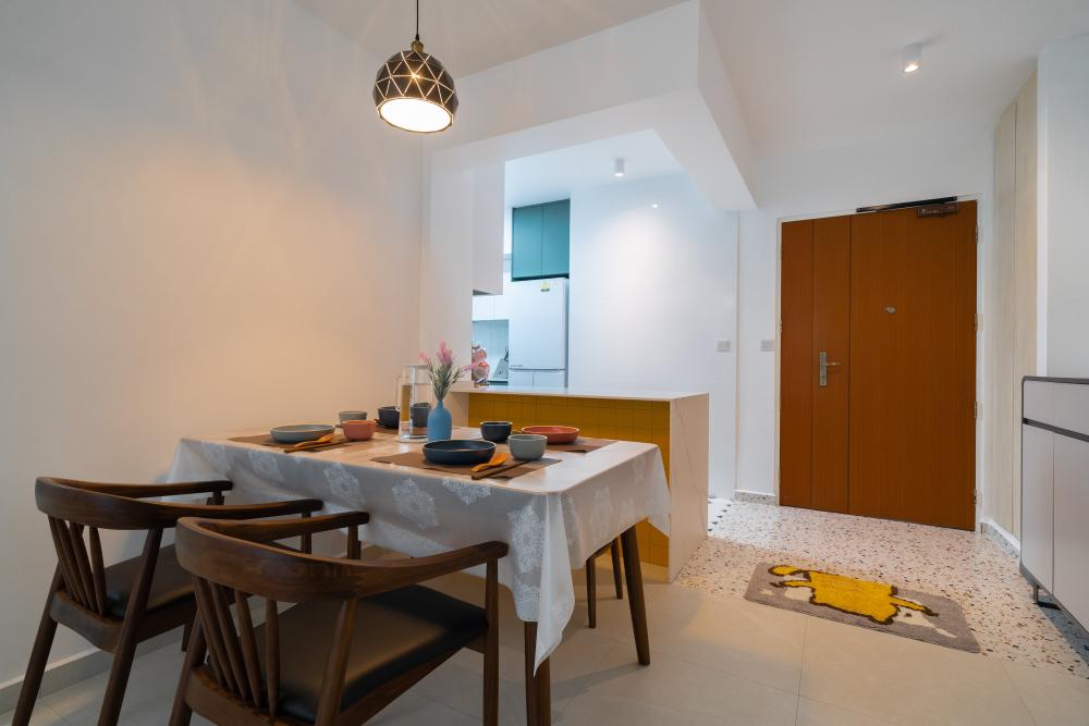 Minimalist Dining Room with Drop Light and Tableware