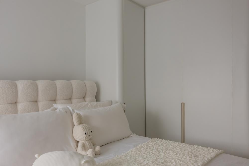 Minimalist Bedroom with Chandelier and Downlights
