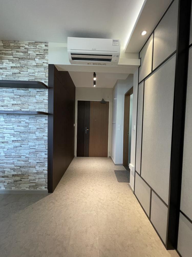 Modern Entryway with Feature Wall and Cove Lighting