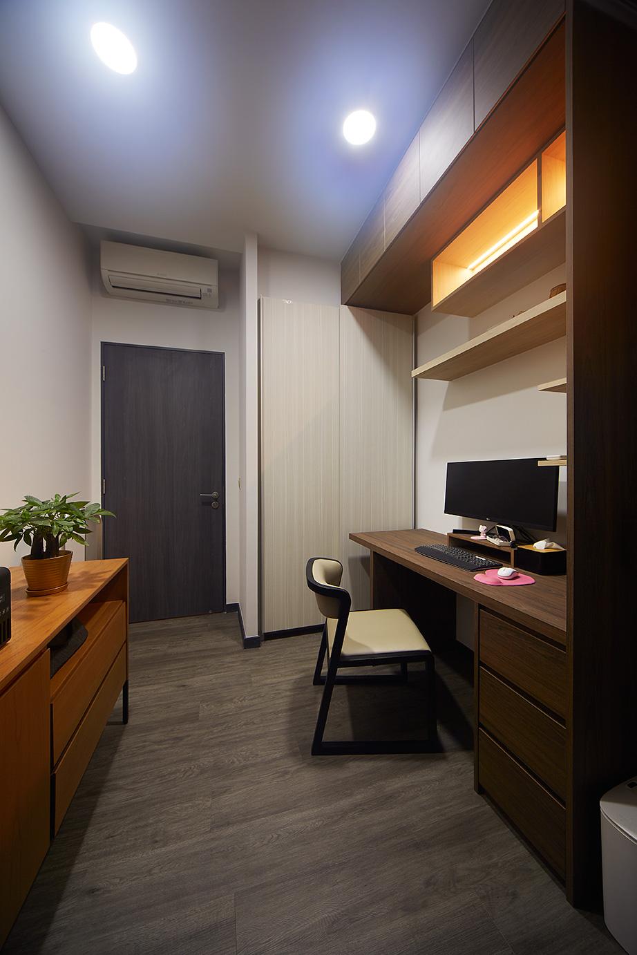 Modern Study with Bookshelf and Cove Lighting