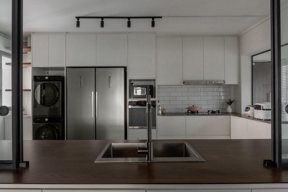 Modern Kitchen with Countertop and Herringbone Tiling