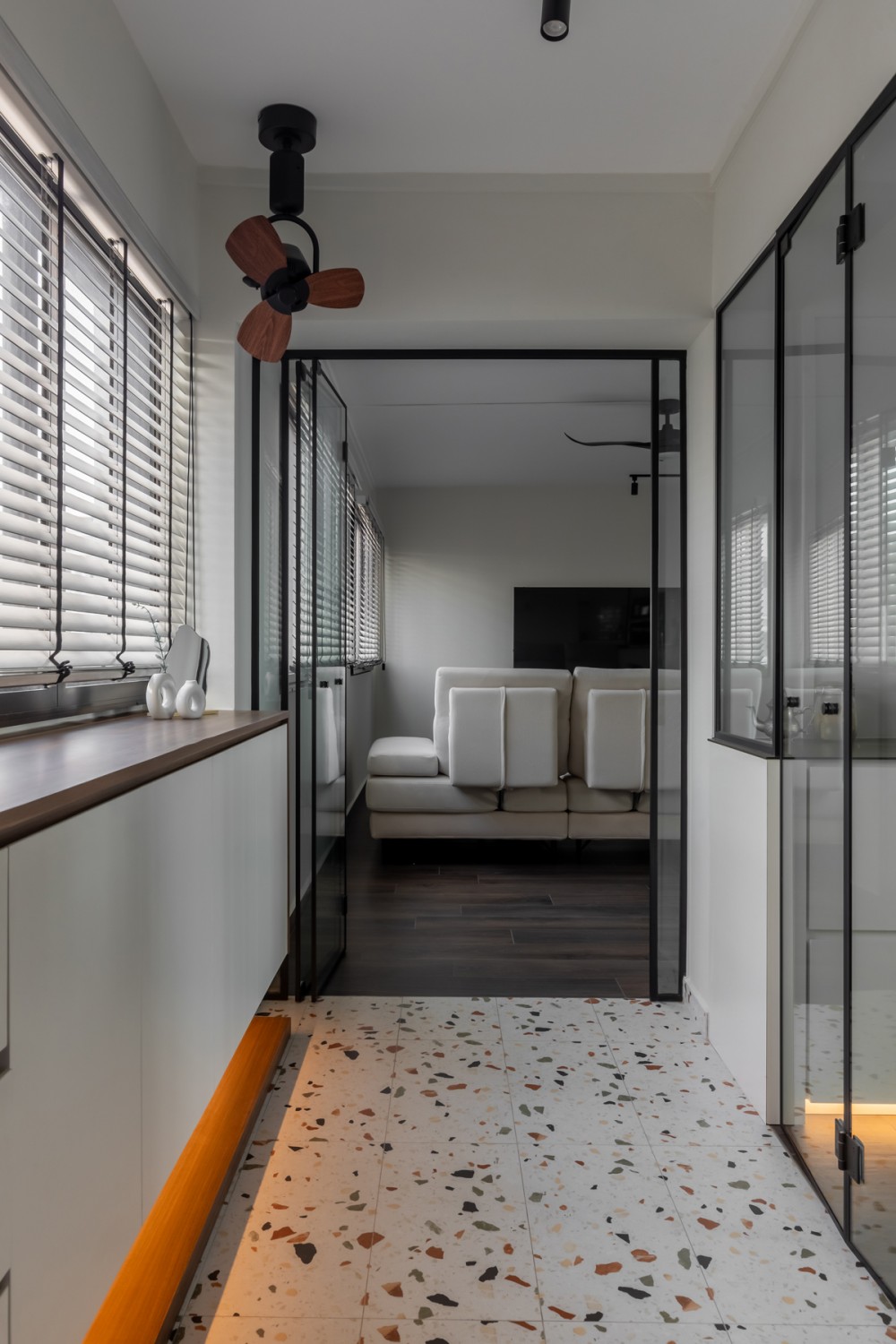 Modern Entryway with Glass Door and Propeller Fan