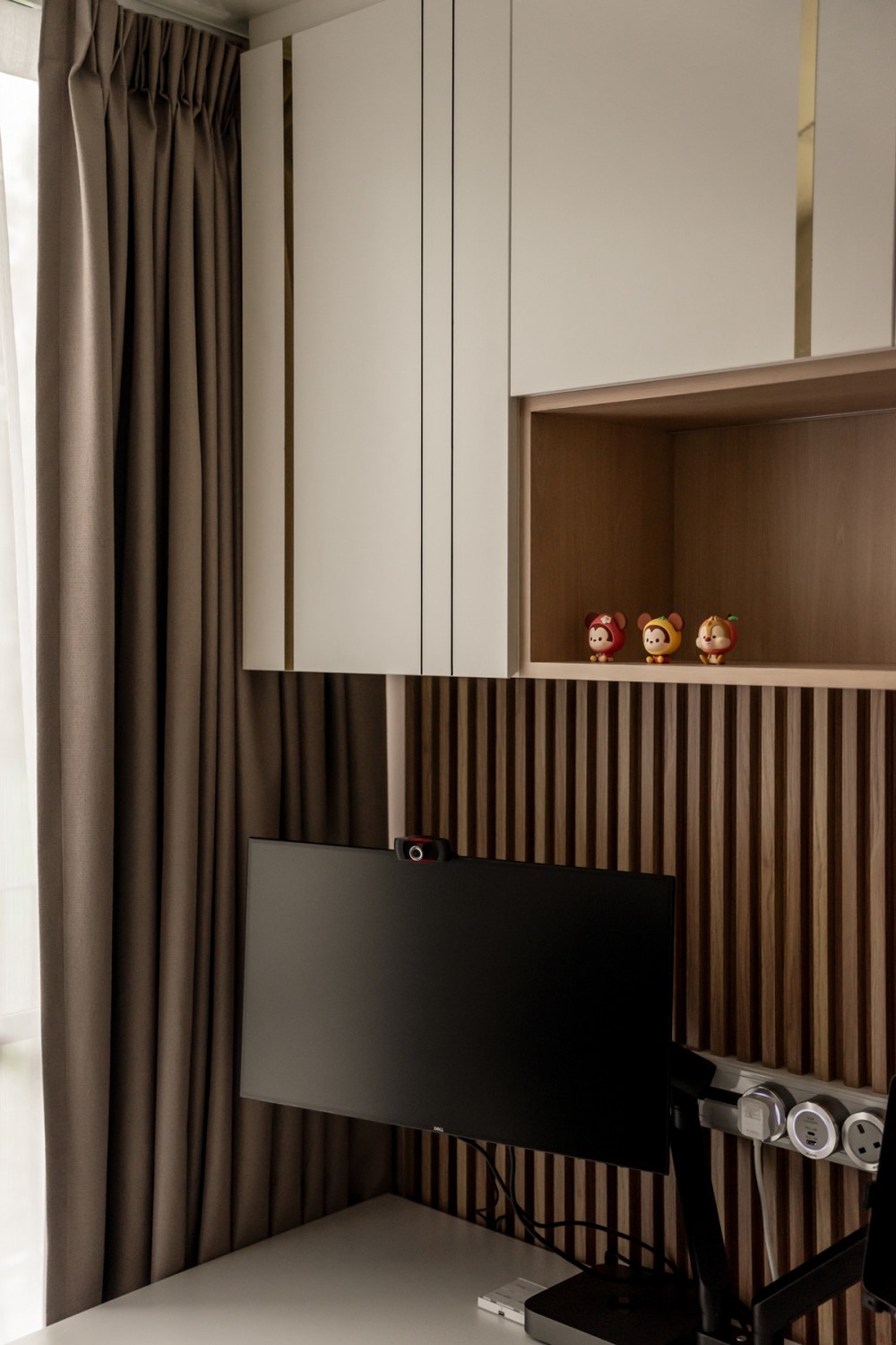 Contemporary Bedroom with Bookshelf and Feature Wall