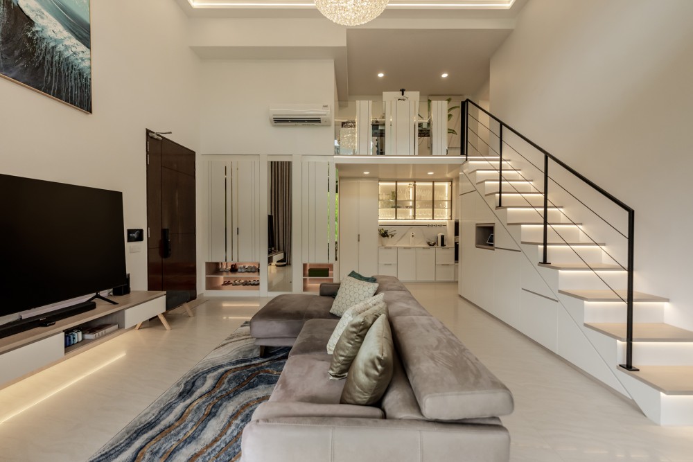 Contemporary Living Room with TV Console and Staircase