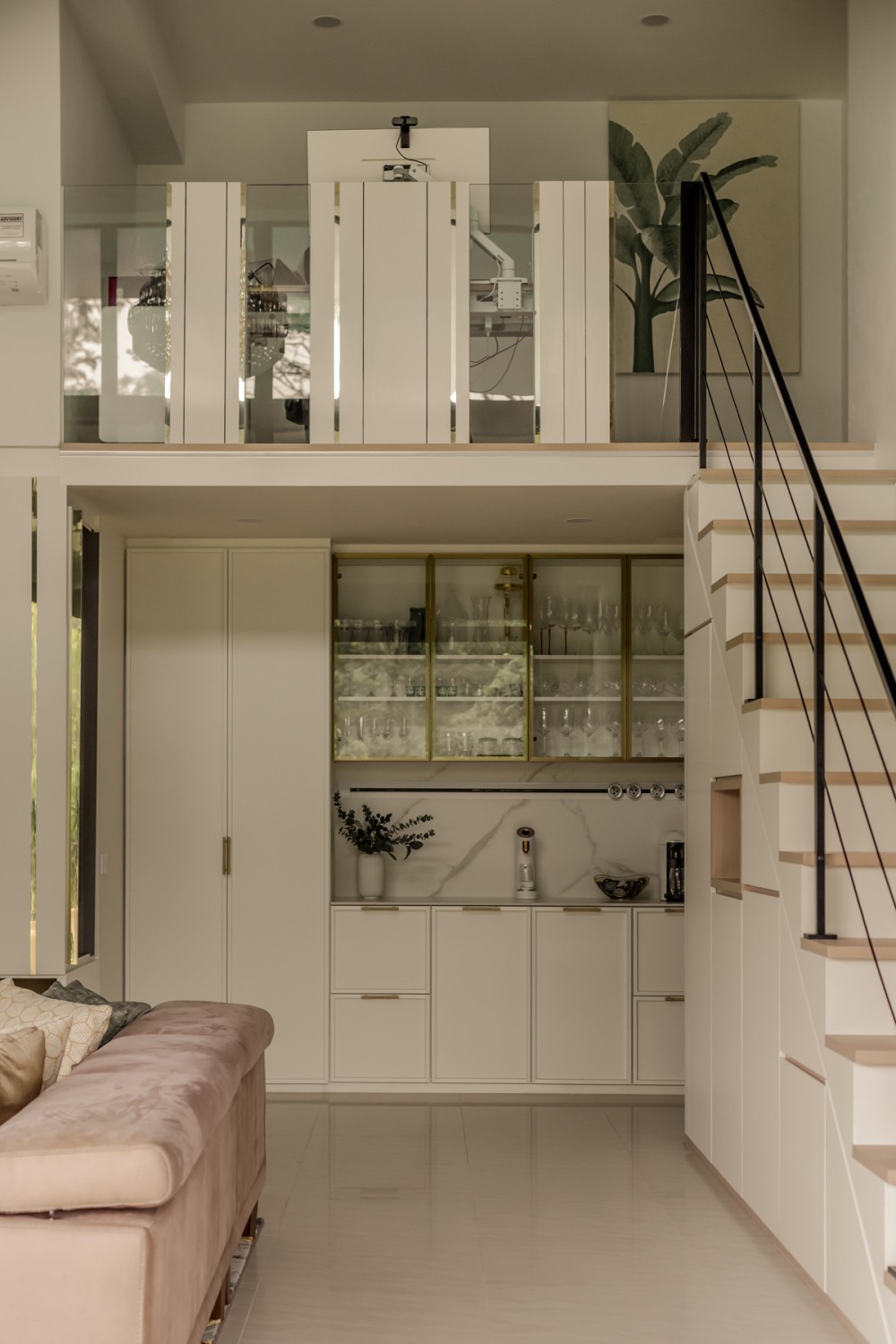 Contemporary Living Room with Feature Wall and Staircase
