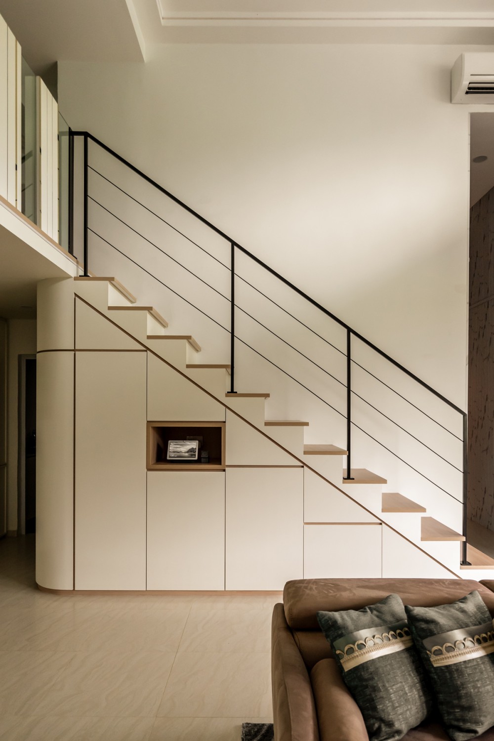 Contemporary Entryway with Feature Wall and Staircase