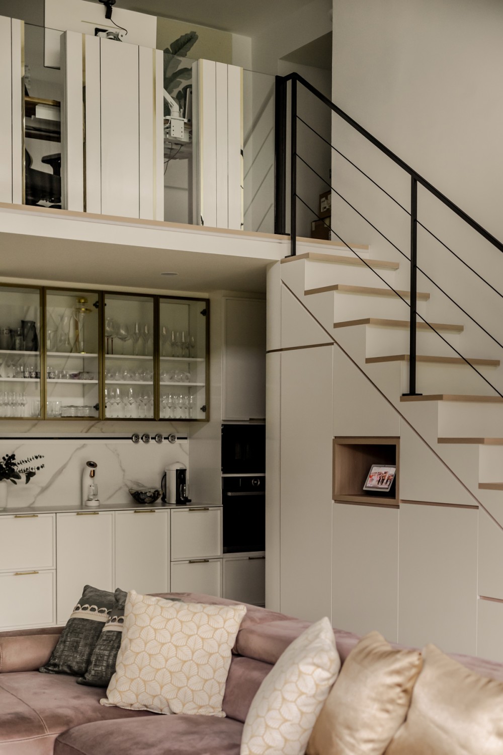 Contemporary Living Room with Feature Wall and Staircase