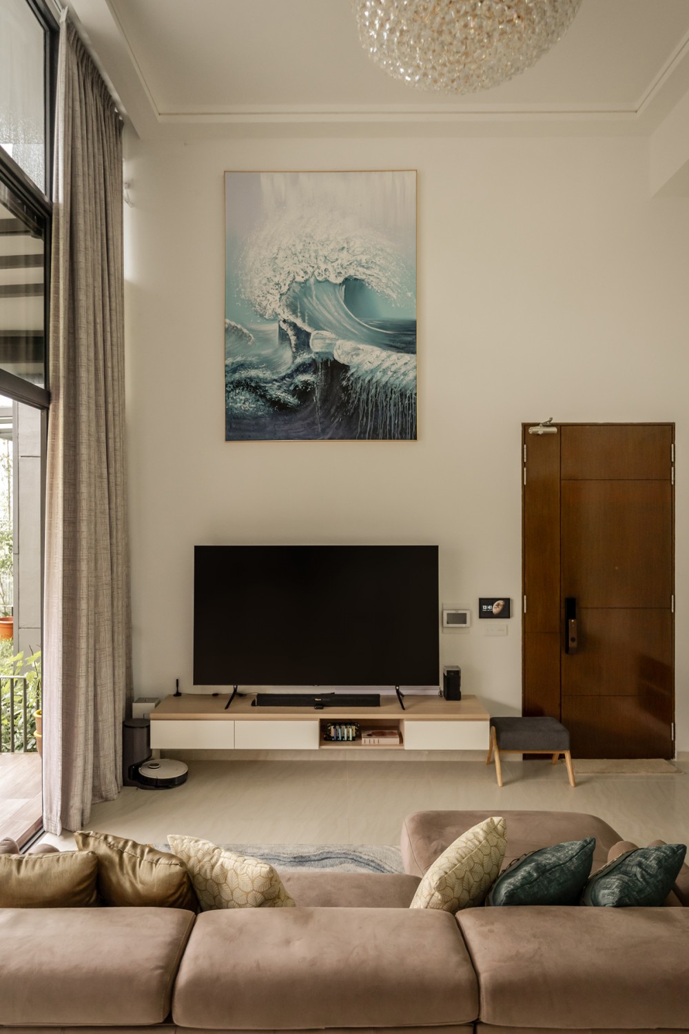 Contemporary Living Room with TV Console and Chandelier