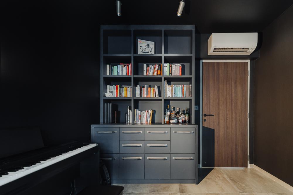Contemporary Home Office with Bookshelf and Display Cabinets
