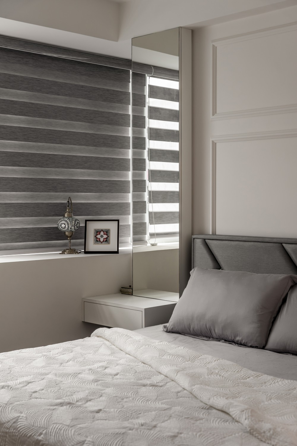 Modern Bedroom with Feature Wall and Mirror