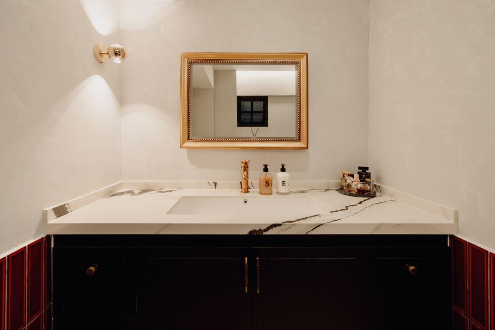 Vintage Bathroom with Countertop and Mirror