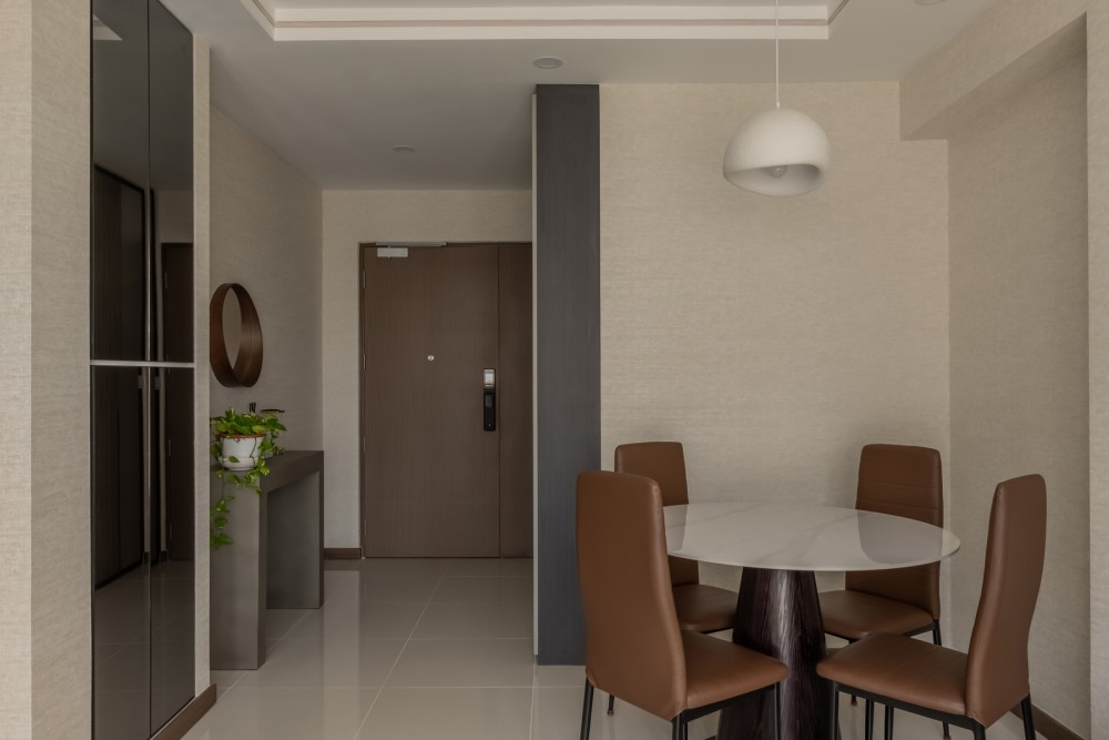 Contemporary Dining Room with Feature Wall and Mirror