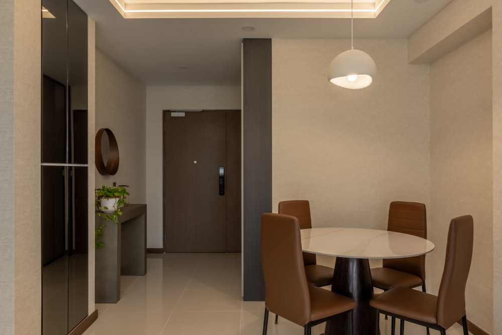 Contemporary Dining Room with Feature Wall and Mirror