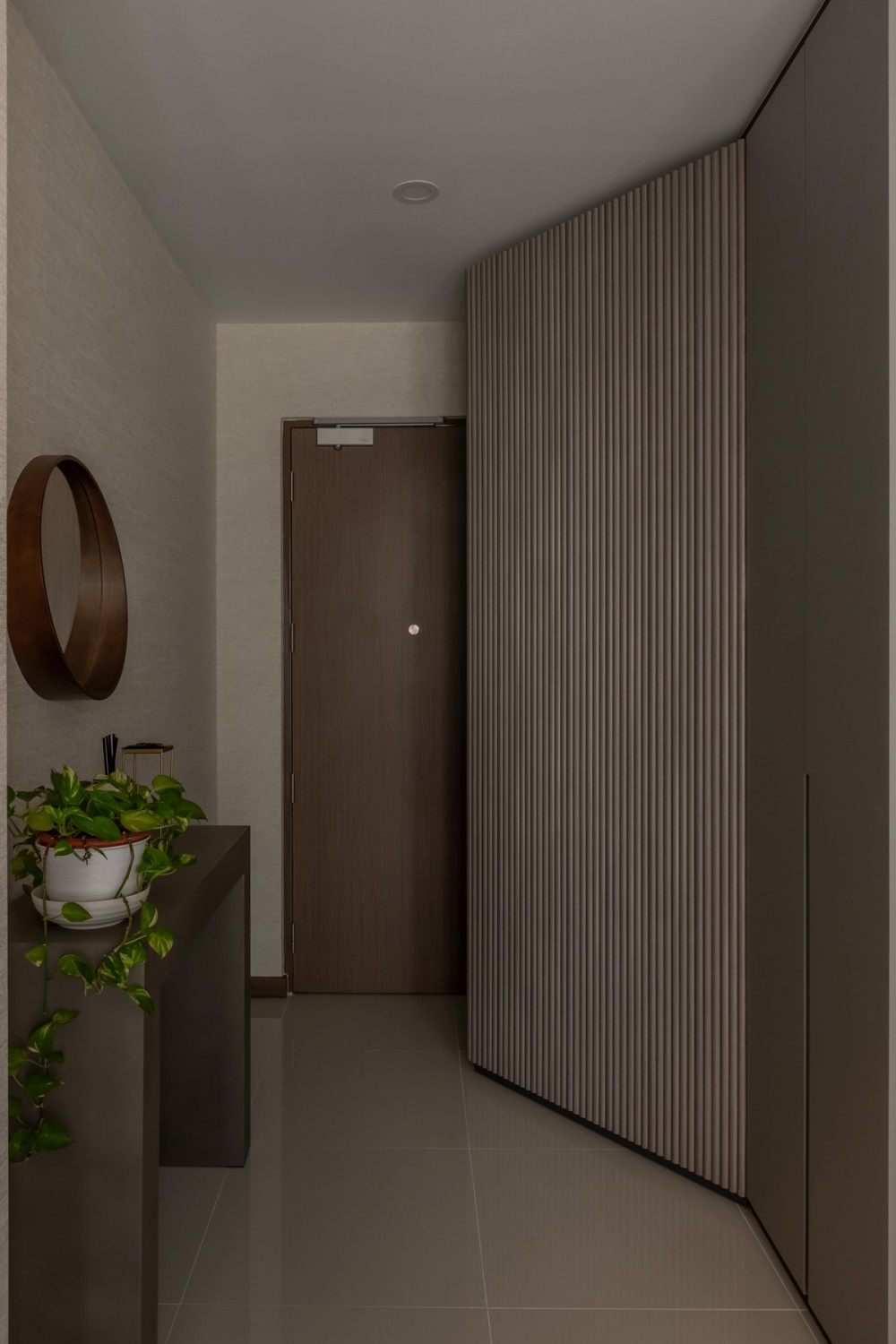 Contemporary Entryway with Feature Wall and Mirror