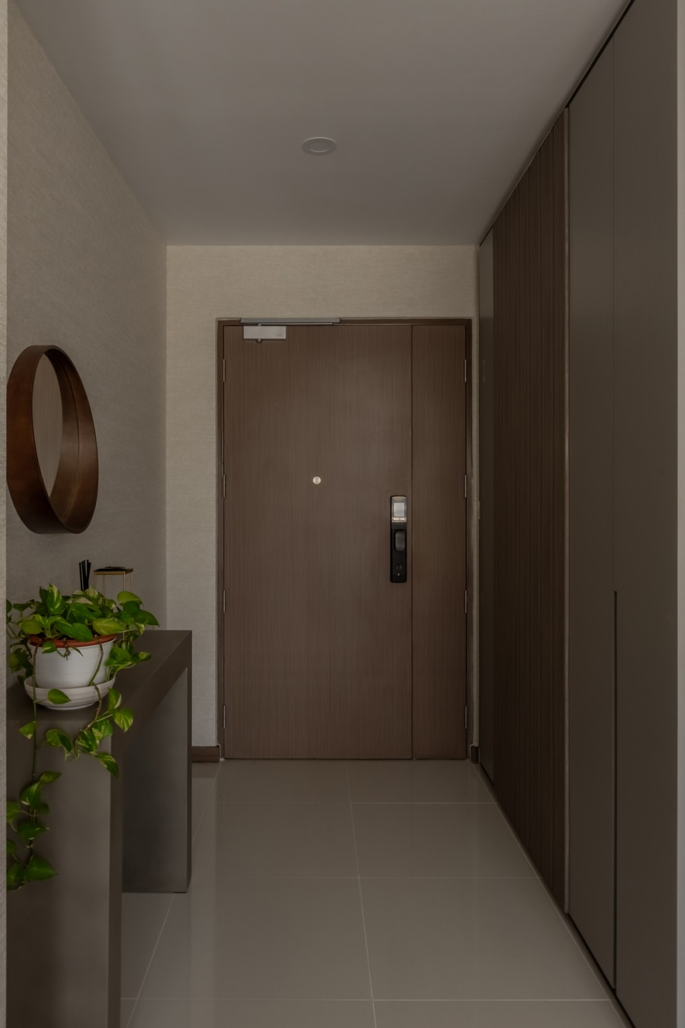 Contemporary Entryway with Mirror and Planters