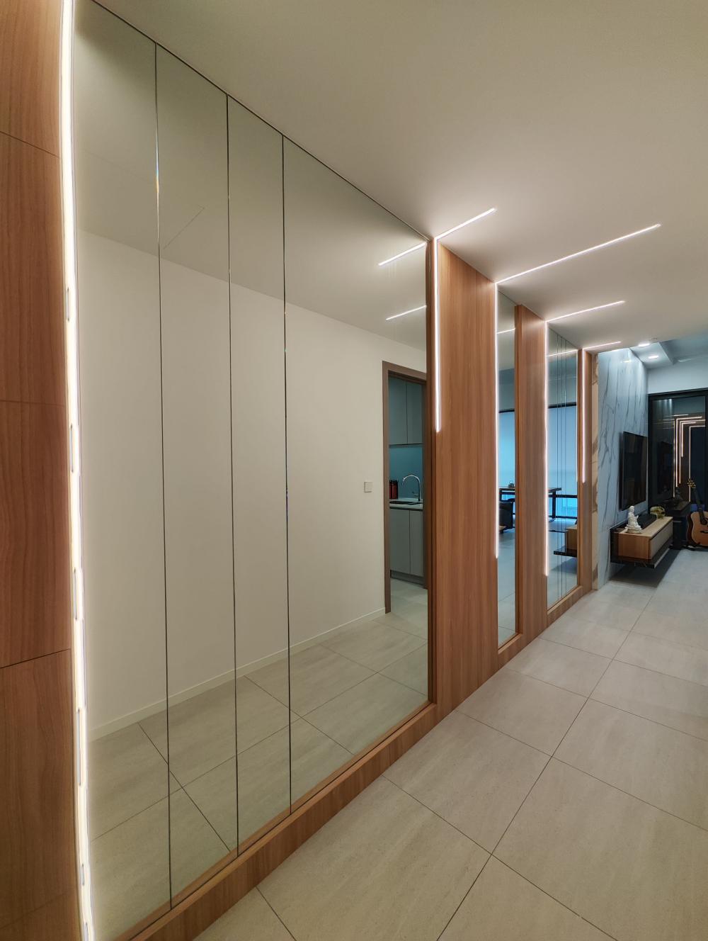 Contemporary Entryway with Homogeneous Tiles and TV Console