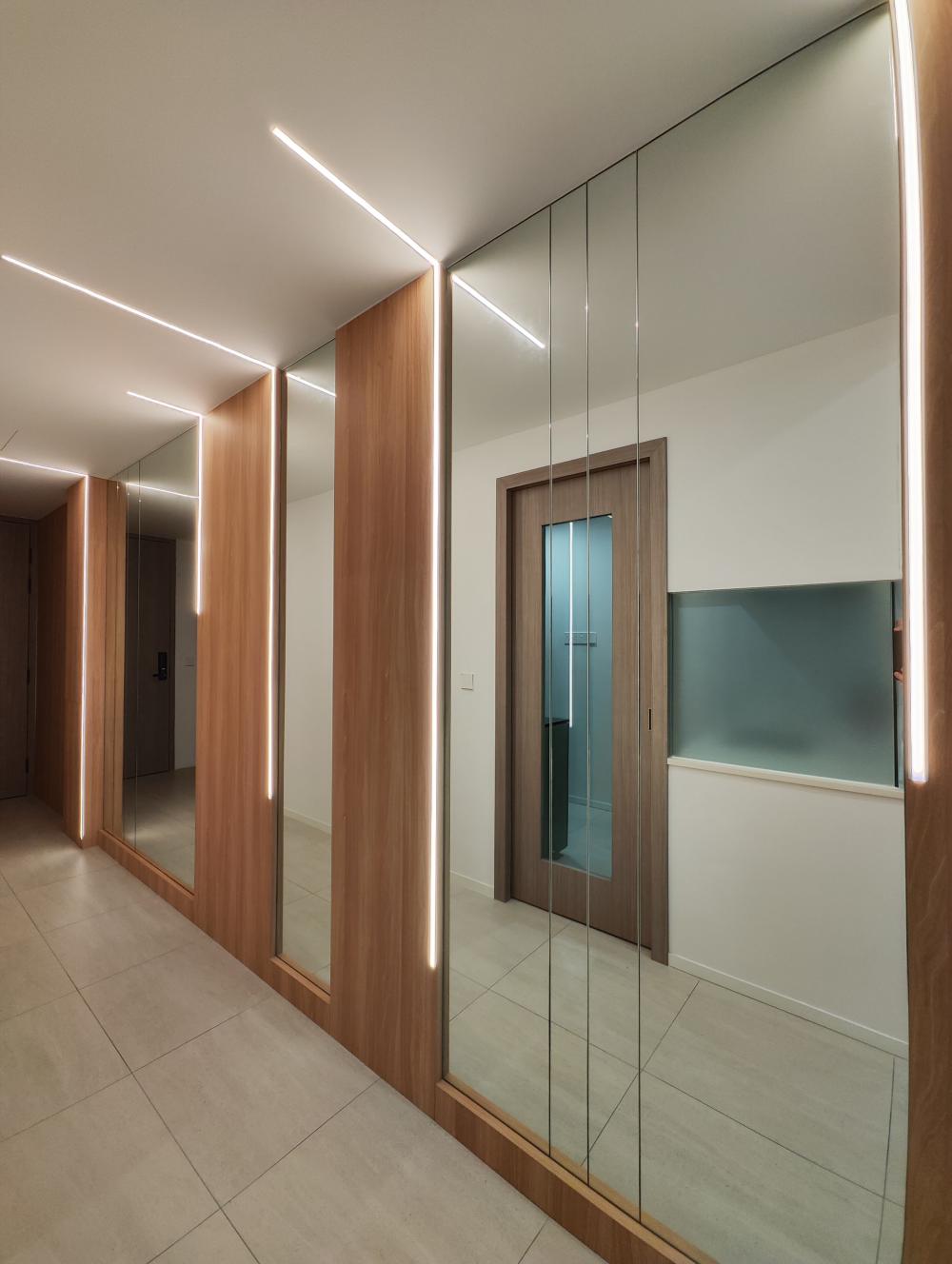 Contemporary Entryway with Homogeneous Tiles and Mirror