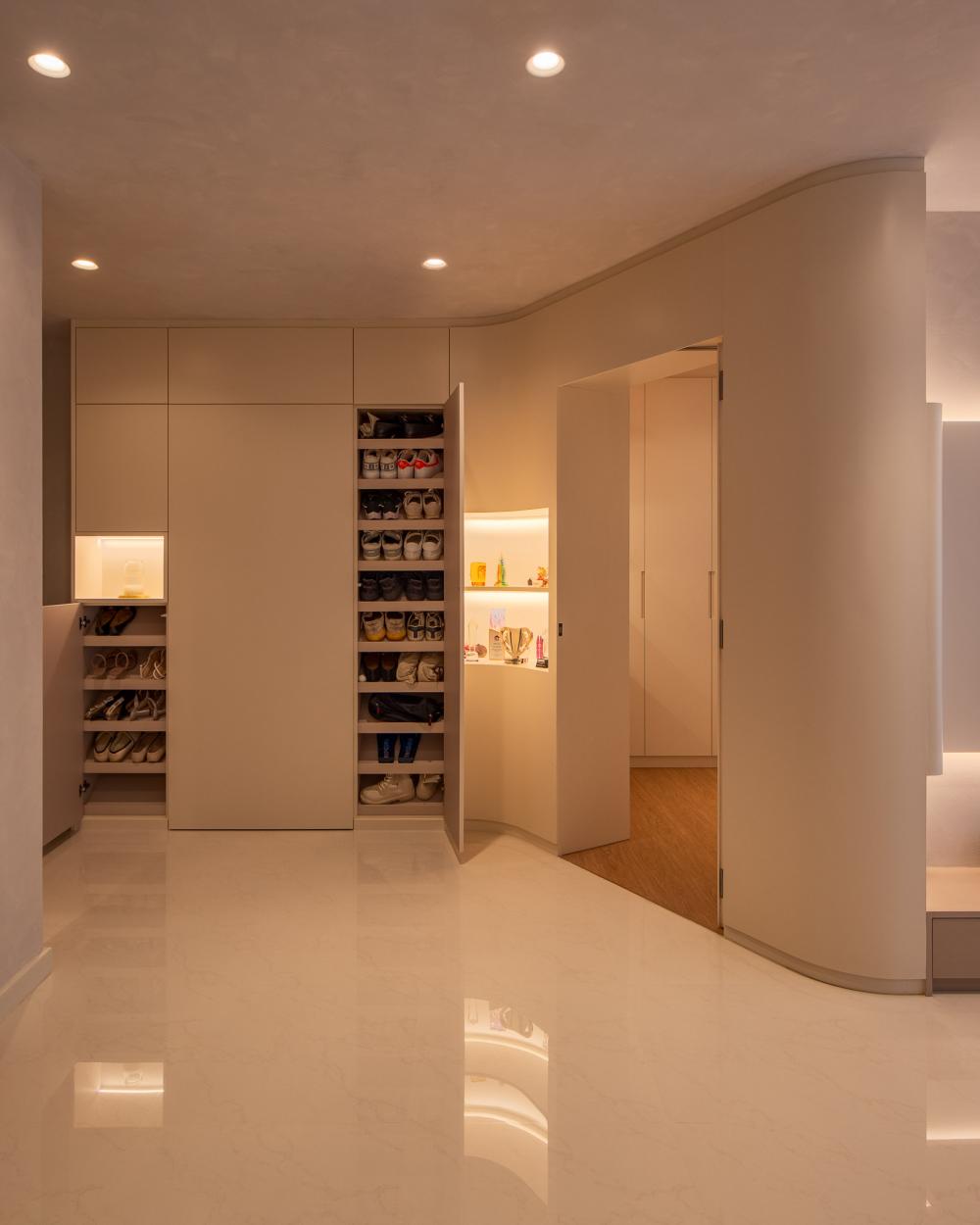 Minimalist Foyer with Shoe Cabinets and Lighting