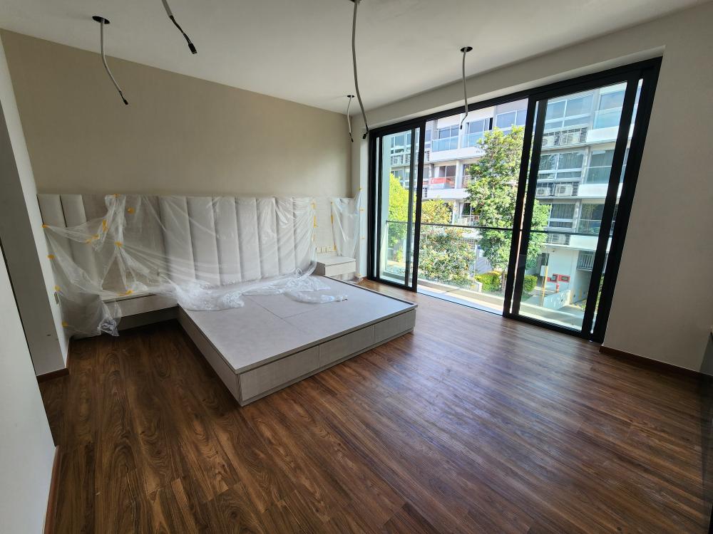 Modern Bedroom with Bedside Table and Bedroom Dresser