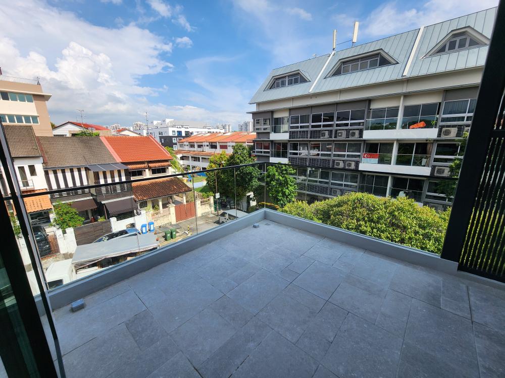 Modern Rooftop with Awning and Outdoor Table