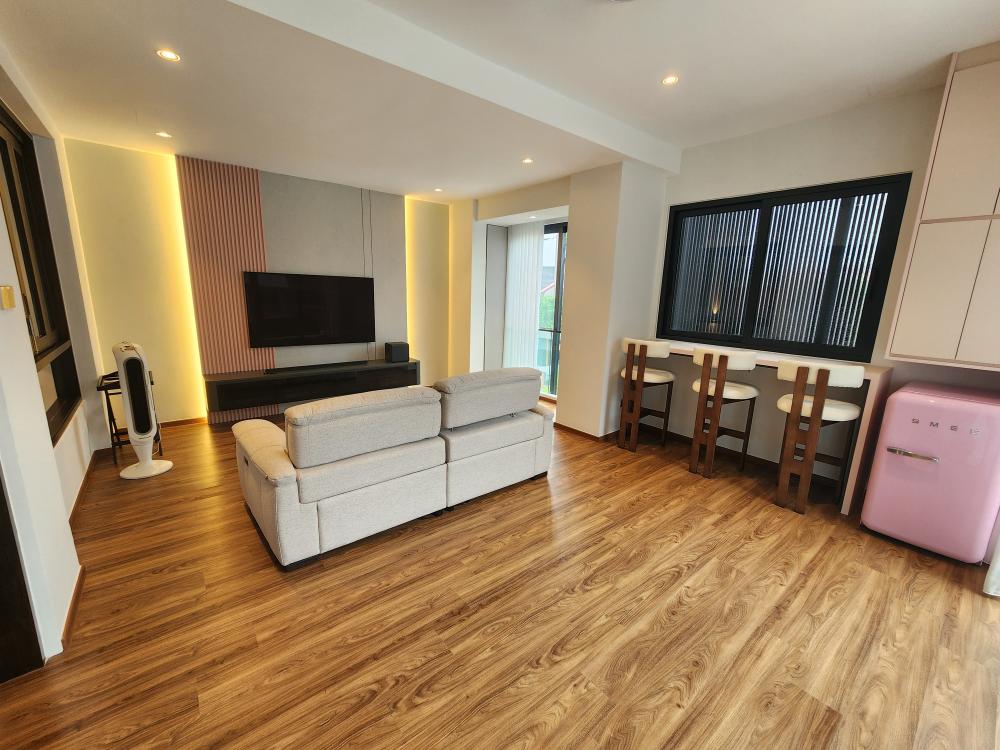 Modern Living Room with TV Console and Feature Wall