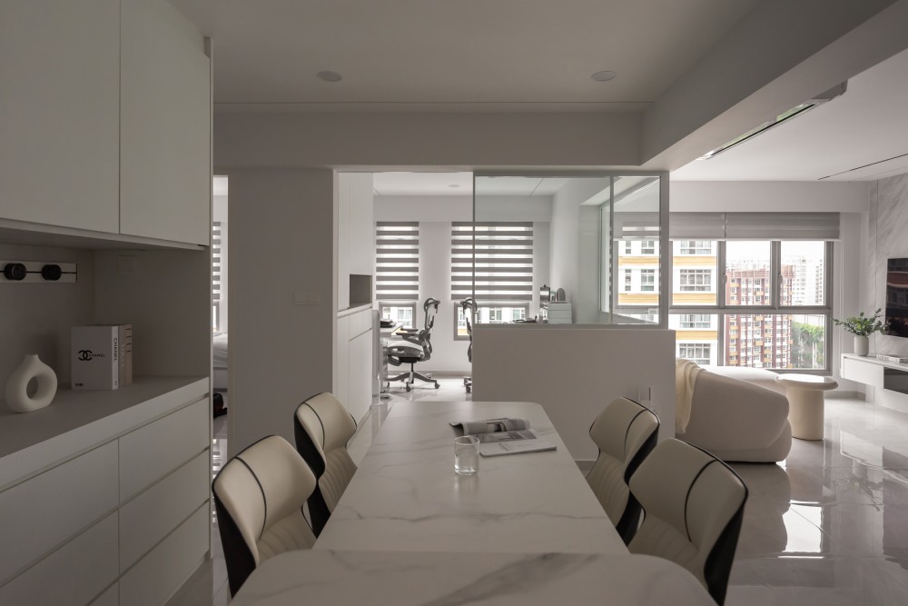 Minimalist Dining Room with Kitchen Island and Glass Door