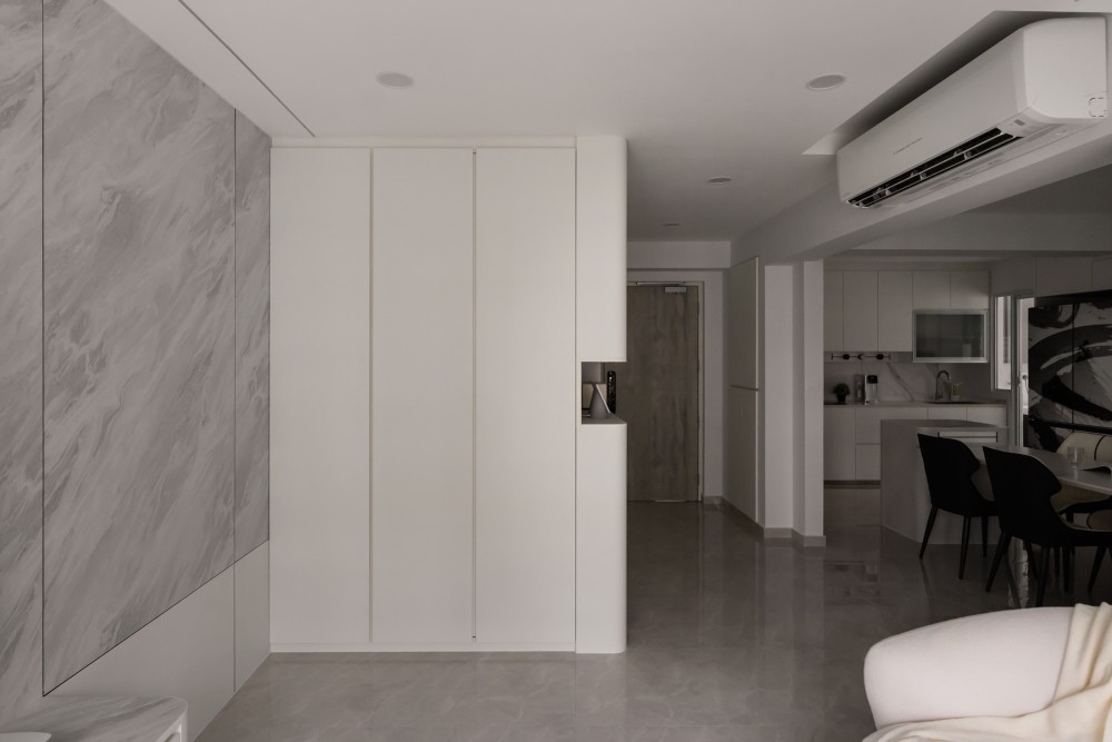 Minimalist Living Room with Feature Wall and Storage Cabinets
