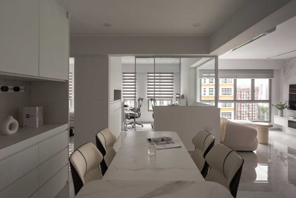 Minimalist Dining Room with Kitchen Island and Glass Door