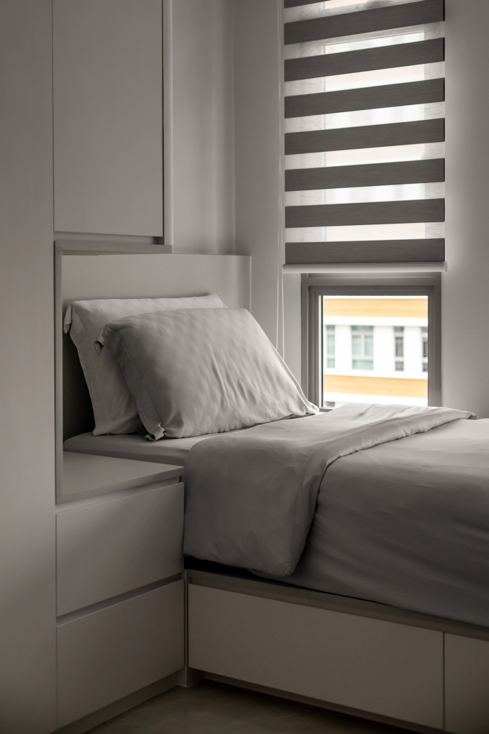 Minimalist Bedroom with Wardrobe and Built-in Bed