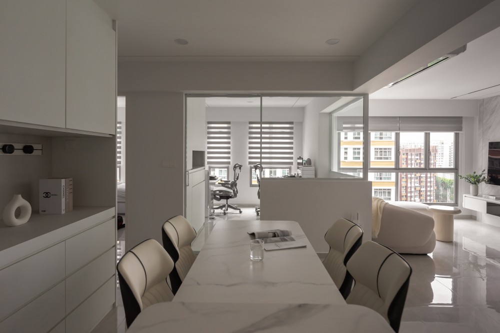 Minimalist Dining Room with Kitchen Island and Glass Door