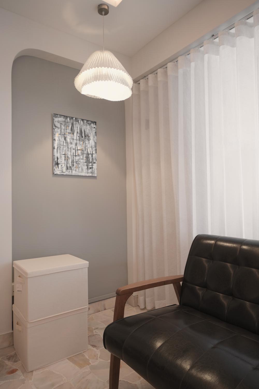 Modern Living Room with Ceiling Light and Sofa