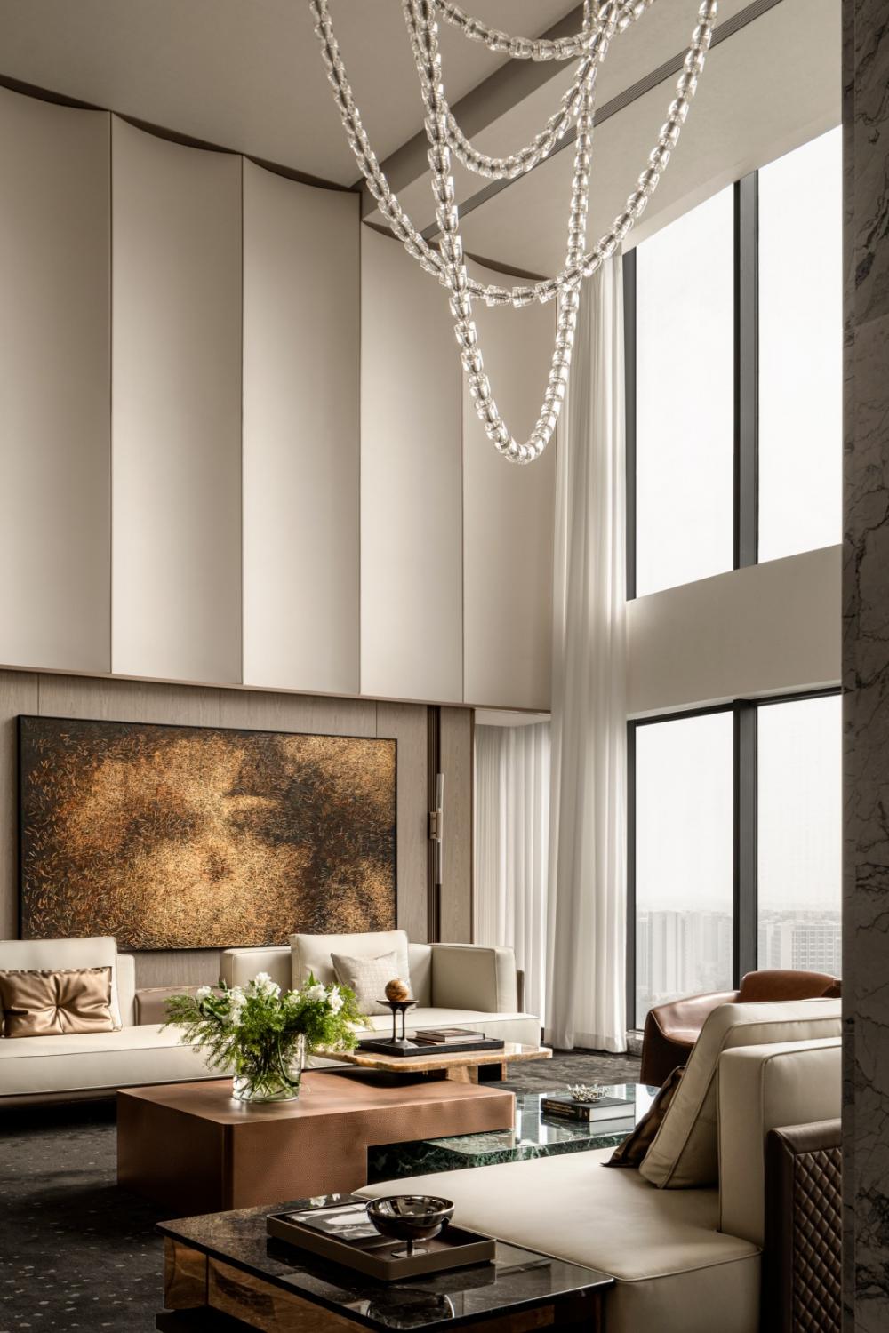 Contemporary Living Room with Homogeneous Tiles and Feature Wall