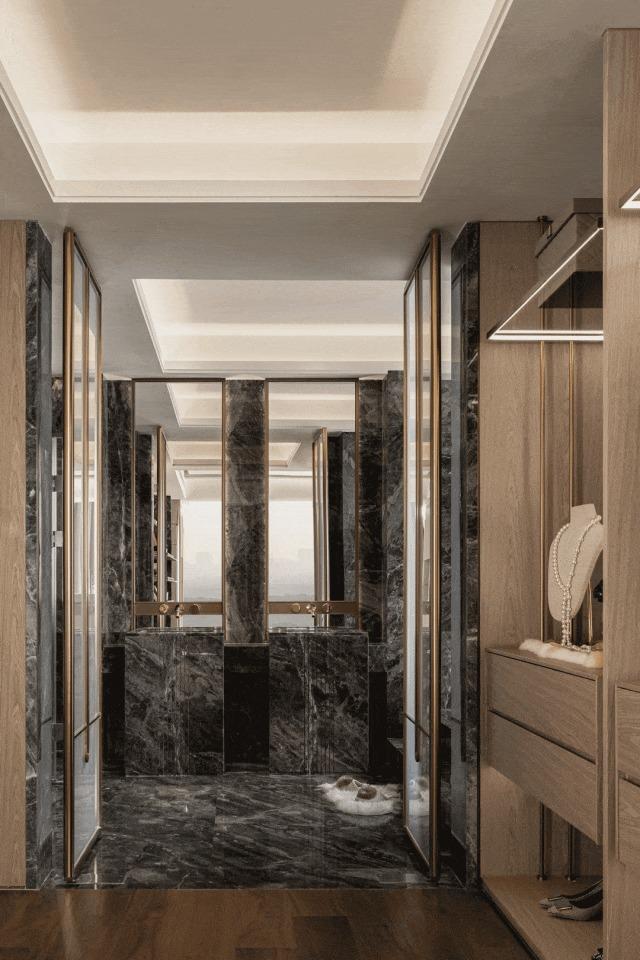 Contemporary Walk-in Wardrobe with Wood Flooring and Mirror