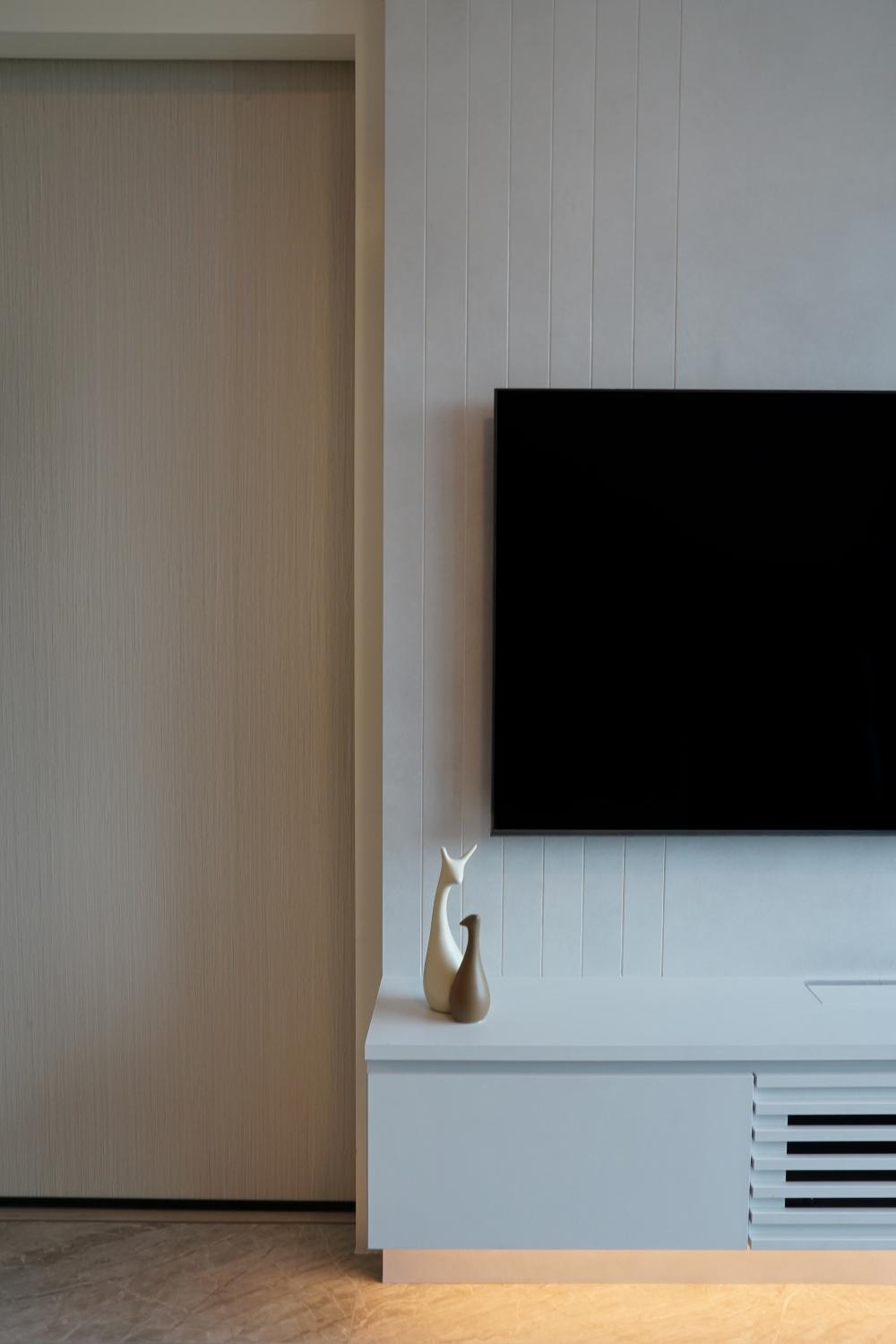 Modern Living Room with TV Console and Cove Lighting