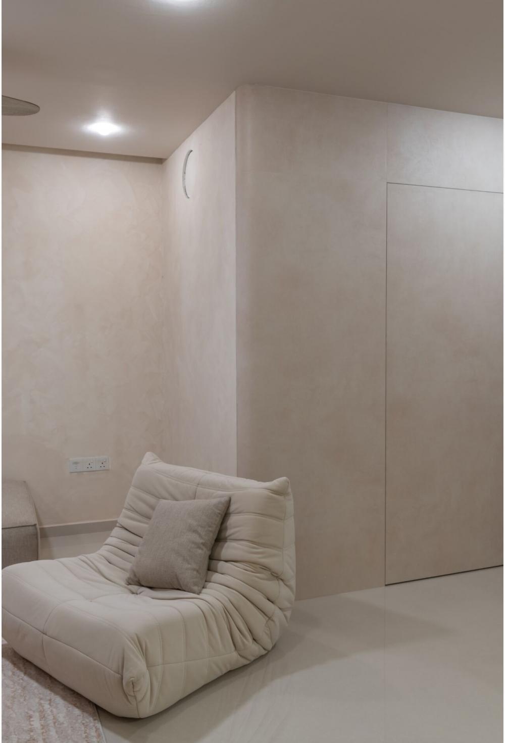 Minimalist Foyer with Artwork and Planters